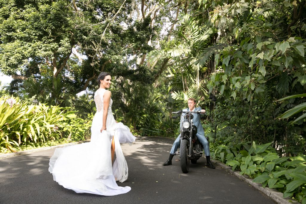 newlyweds exit their green hawaii wedding