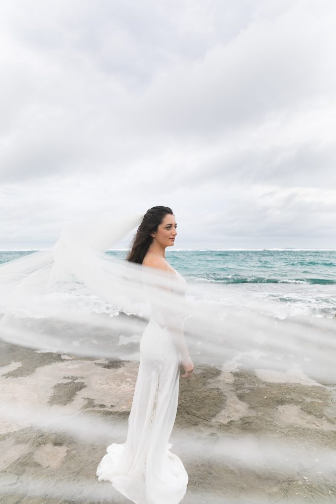brides veil blowing in wind Oahu, hawaii
