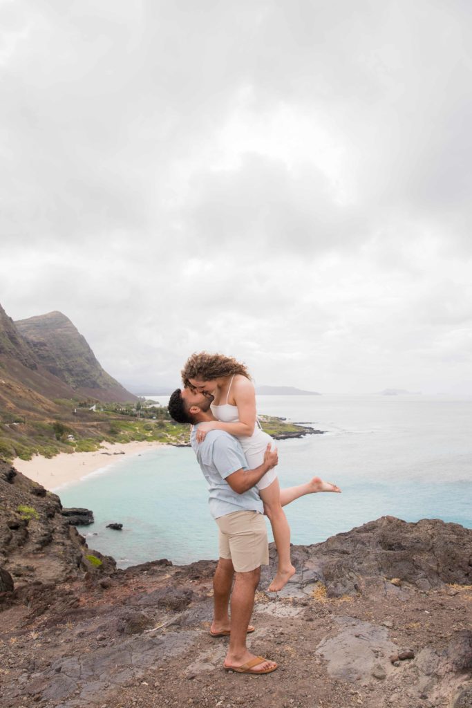engagement photos along cliffside hawaii